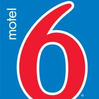 Motel 6 Houston North - Spring Logo