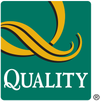 Quality Inn & Suites Palm Island Indoor Waterpark Logo