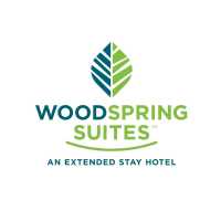 WoodSpring Suites Louisville Clarksville Logo