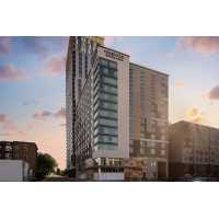 Homewood Suites by Hilton Charlotte Uptown First Ward Logo