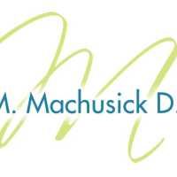 Marilyn M. Machusick, D.D.S., Inc. Logo