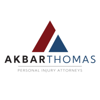 Akbar Thomas Law, Personal Injury Attorneys Logo