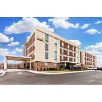 Home2 Suites by Hilton Olive Branch Logo