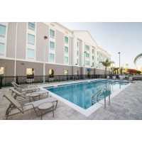 Hampton Inn & Suites Orlando at SeaWorld Logo