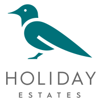 Holiday Estates Manufactured Housing Community Logo