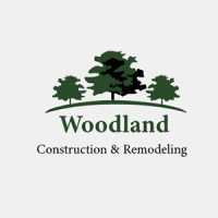 Woodland Construction and Remodeling Logo