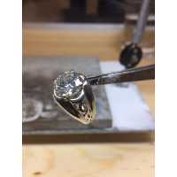 Dong Jewelry & Watch Repair Logo