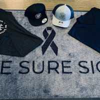 The Sure Sign Logo