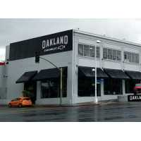 Oakland Chevrolet Service & Parts Logo