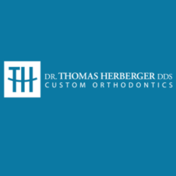 Custom Orthodontics: Dr. Thomas Herberger, Inc.