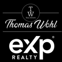 Thomas Wohl Real Estate - eXp realty Logo