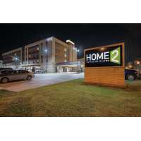 Home2 Suites by Hilton Dallas Grand Prairie Logo