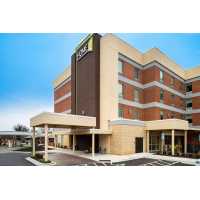 Home2 Suites by Hilton Charlotte Mooresville Logo