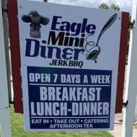 Eagle Mini Diner Authentic Jamaican and American Cuisine Logo