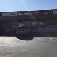 McMinnville At Home Mattress And Furniture Superstore Logo