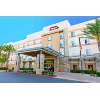 Hampton Inn & Suites Riverside/Corona East Logo