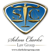 The Sekou Clarke Law Group Logo