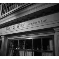 Wolf & Wolf, Attorneys at Law Logo