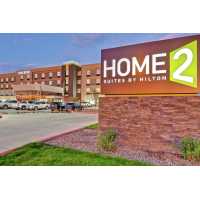 Home2 Suites by Hilton Pecos Logo