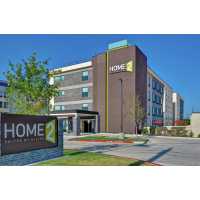 Home2 Suites by Hilton McKinney Logo