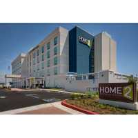 Home2 Suites by Hilton Garden Grove Anaheim Logo