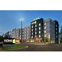 Home2 Suites by Hilton Columbia Harbison Logo
