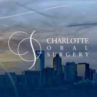 Charlotte Oral Surgery: Kent E. Moore, MD, DDS Logo