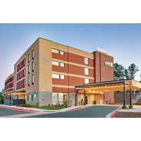 Home2 Suites by Hilton Raleigh Durham Airport RTP Logo