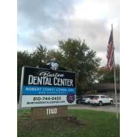 Burton Dental Center: Comini Robert A DDS Logo
