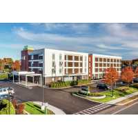 Home2 Suites by Hilton Albany Wolf Rd Logo