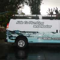Able To Plumbing  & Rooter Logo