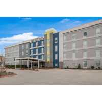Home2 Suites by Hilton Baytown Logo
