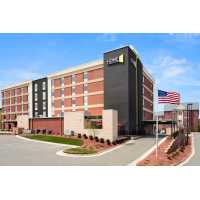 Home2 Suites by Hilton Greensboro Airport, NC Logo
