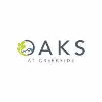 Oaks at Creekside Apartments Logo