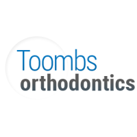 Toombs Orthodontics - Prairie Village Logo