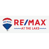 RE/MAX AT THE LAKE Logo