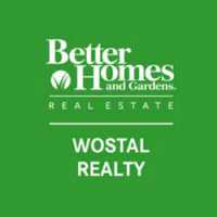 Better Homes and Gardens Real Estate Wostal Realty Logo