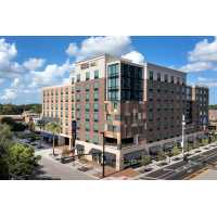 Home2 Suites by Hilton Orlando Downtown Logo