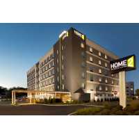 Home2 Suites By Hilton Hasbrouck Heights Logo