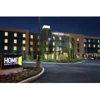 Home2 Suites by Hilton Seattle Airport Logo