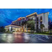 Hampton Inn & Suites Fort Myers-Estero/FGCU Logo
