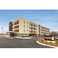 Home2 Suites by Hilton Statesboro Logo