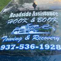 Hook And Book Towing And Recovery Logo