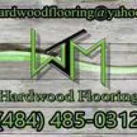 WJM Hardwood Flooring Logo