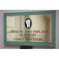 Cosmetic & Implant Dentistry of NY Logo