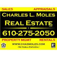 Charles L. Moles Real Estate, LLC Logo