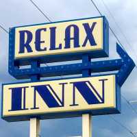 Relax Inn Lawton Logo