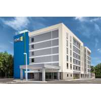 Home2 Suites by Hilton Tampa Westshore Airport Logo
