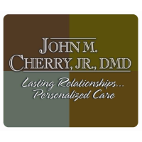 Dr. John M. Cherry DMD Logo