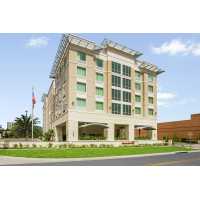 Hampton Inn & Suites Orlando/Downtown South - Medical Center Logo